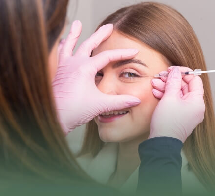 Woman receiving Botox injection.