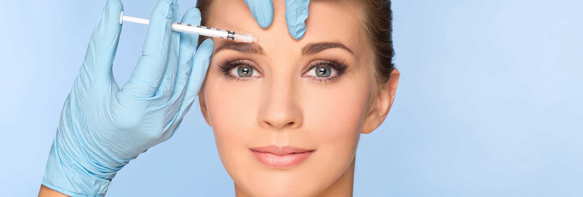 Beautiful woman receiving beauty injections.