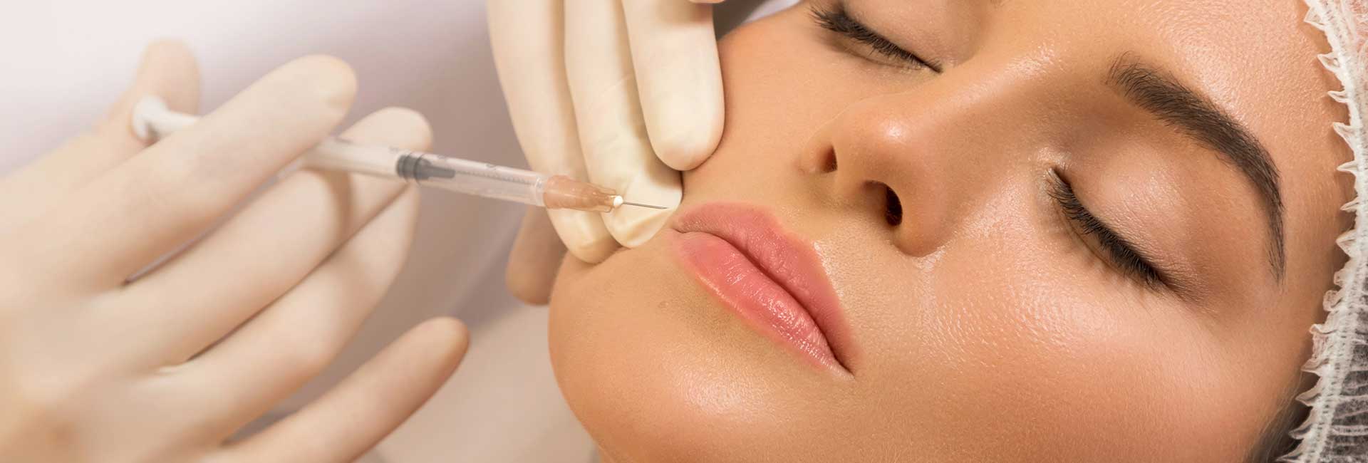 Beautiful woman receiving Botox injections.